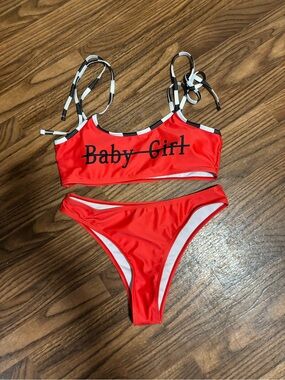 Red "Baby Girl" Bikini Set with Black & White Straps Both Size Medium.
